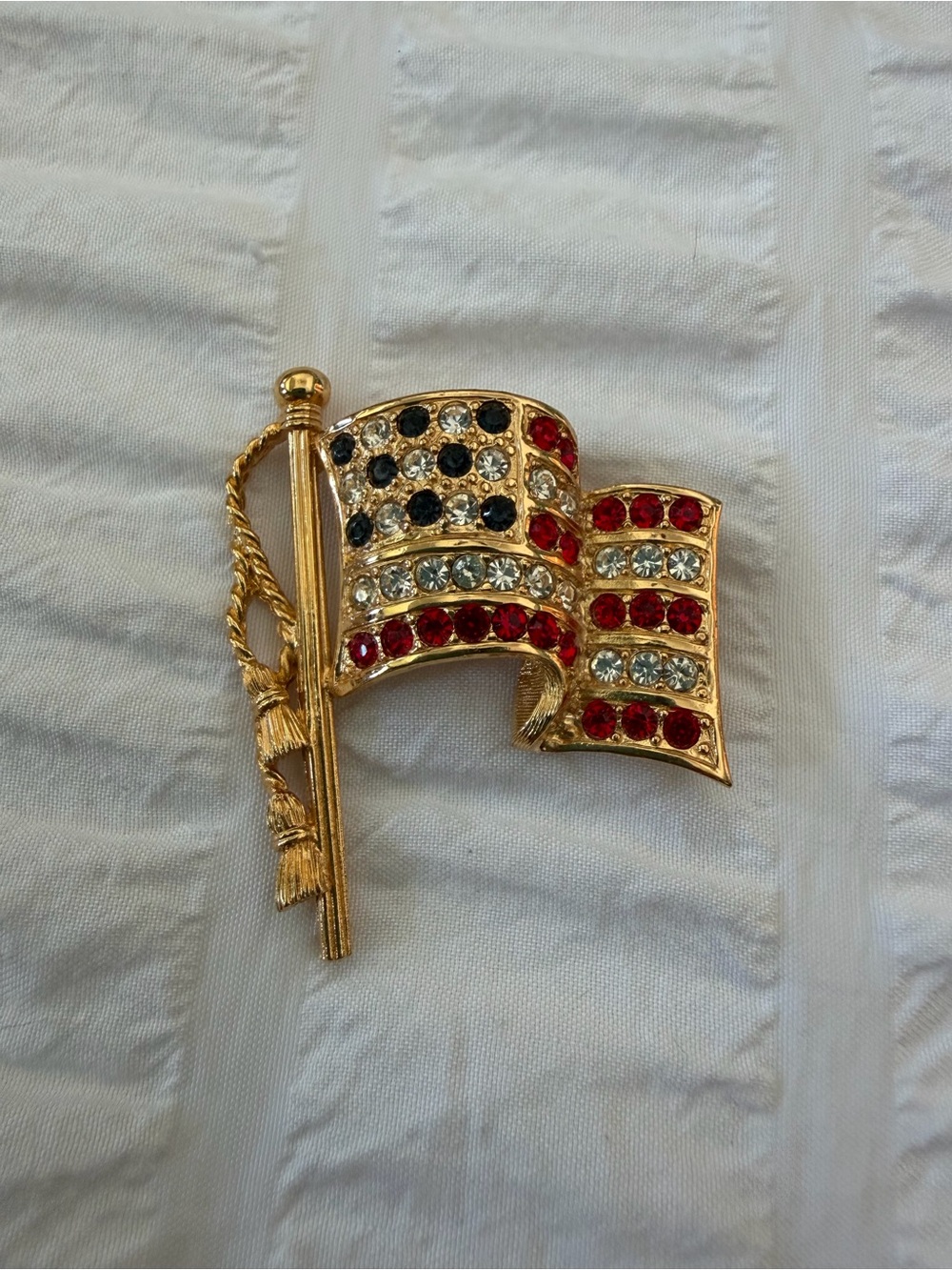 Vintage Napier Gold-Tone American Flag Brooch with Red, Clear & Blue Rhinestones